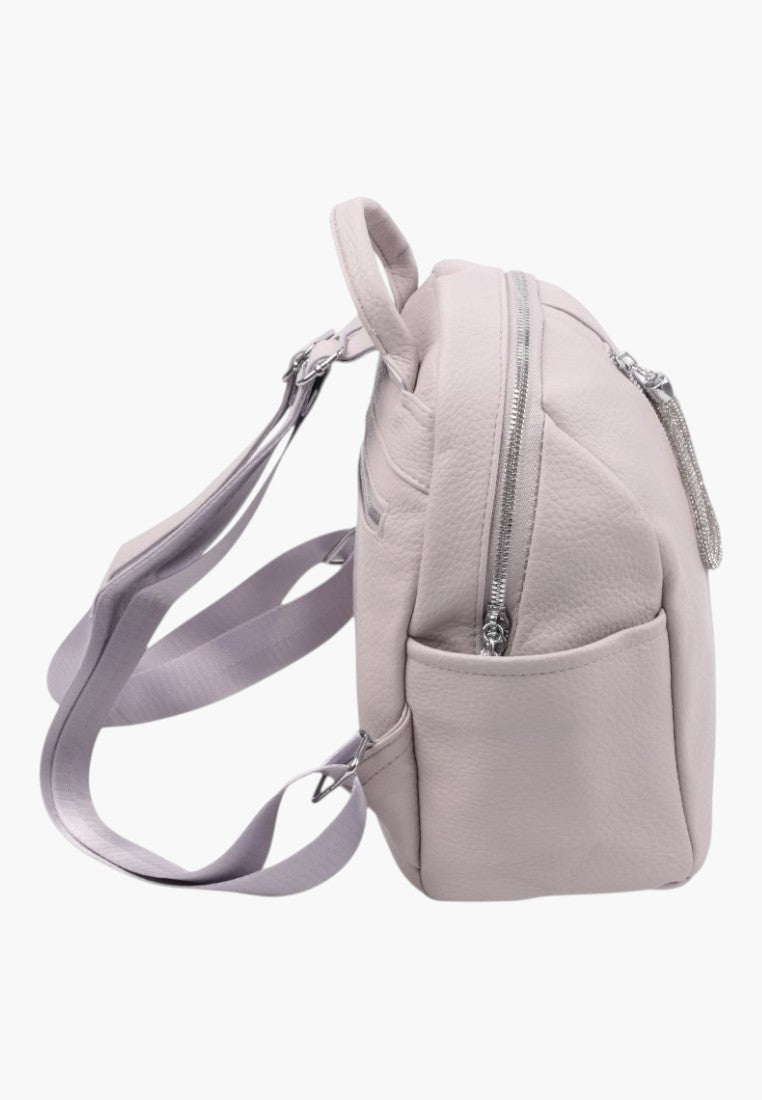 Falio grey faux leather urban backpack with side pockets, silver zippers, and adjustable straps, side view