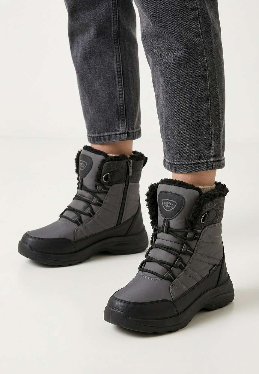 Falio grey faux leather and textile winter trekking boots with black laces, side zippers, and warm faux fur lining.