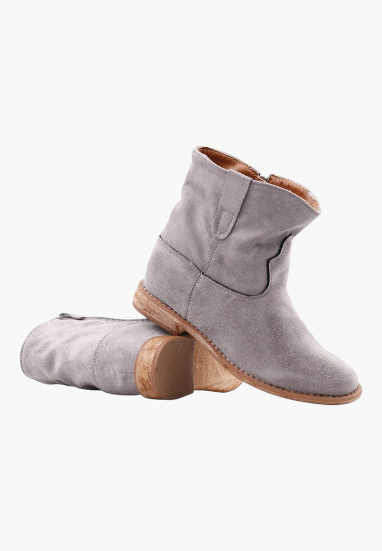 Falio grey faux suede ankle boots with a rounded toe and low heel, perfect for stylish and comfortable daily wear.