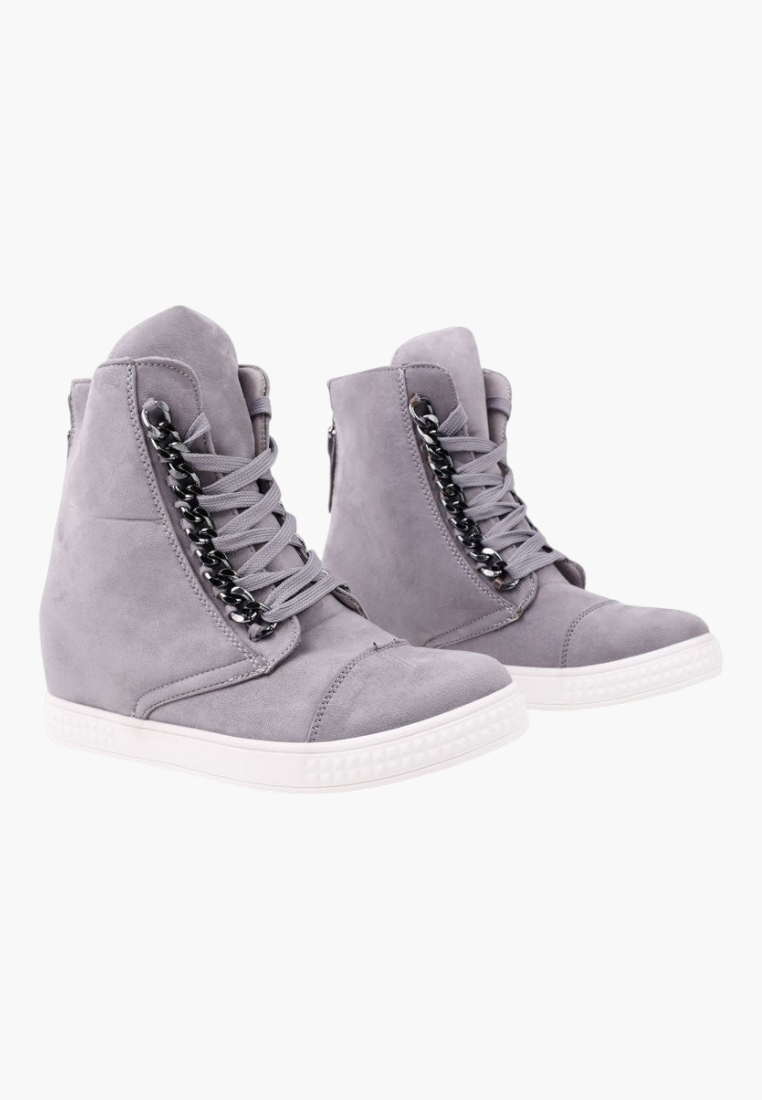 Falio grey faux suede wedge sneakers with lace-up front, decorative chain detail, and white rubber soles.