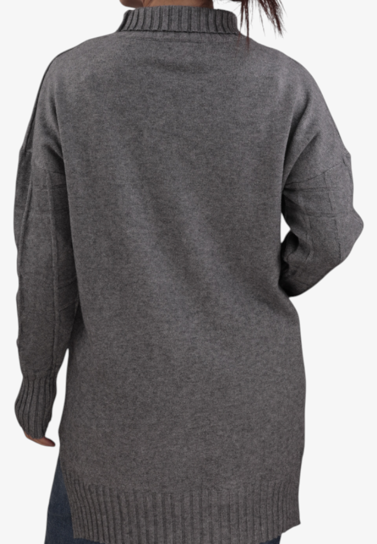 Back view of a Falio plus size grey knitted sweater with a mock neck and long sleeves on a model