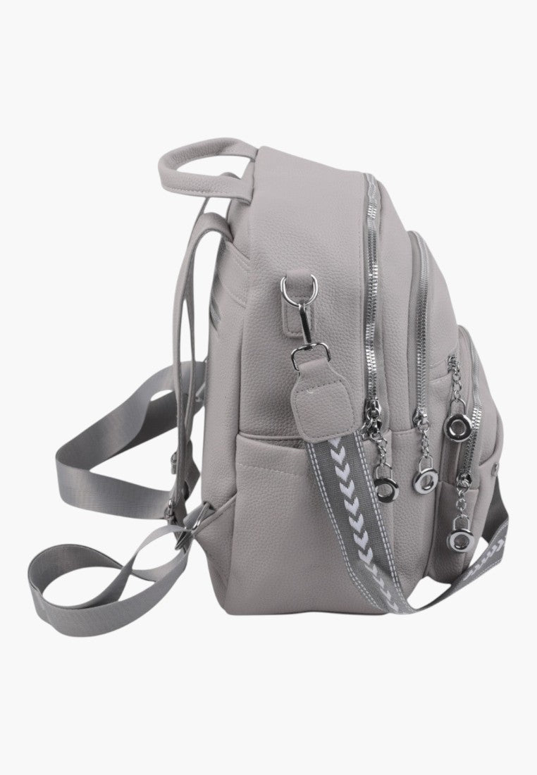 Falio grey urban women's backpack with silver zippers and patterned shoulder straps, side view.