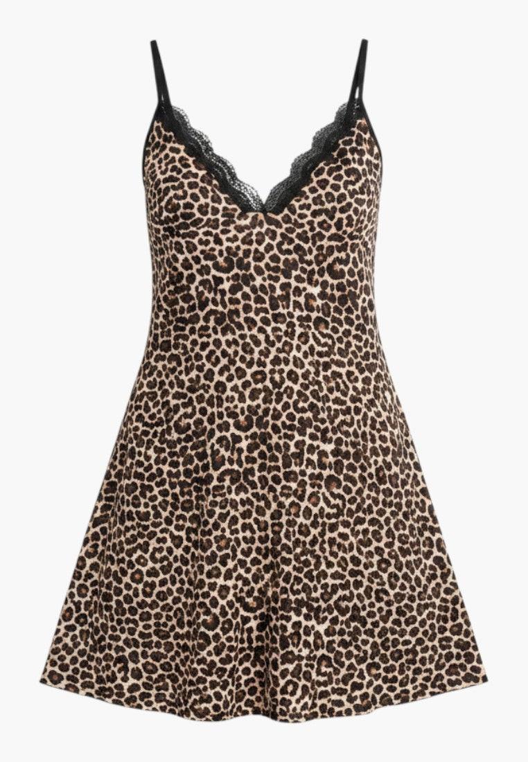 Falio leopard print chemise with black lace trim. Short, spaghetti strap nightgown for comfortable sleep or loungewear.