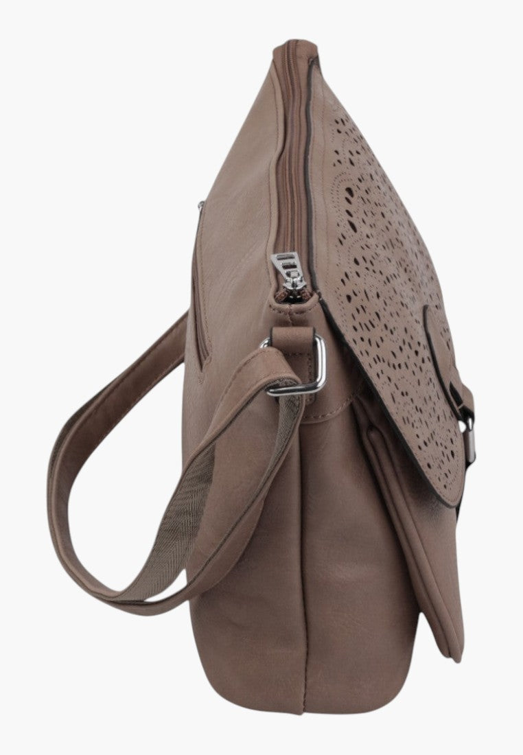 Falio light grey crossbody bag with a laser-cut floral flap and adjustable shoulder strap, side view