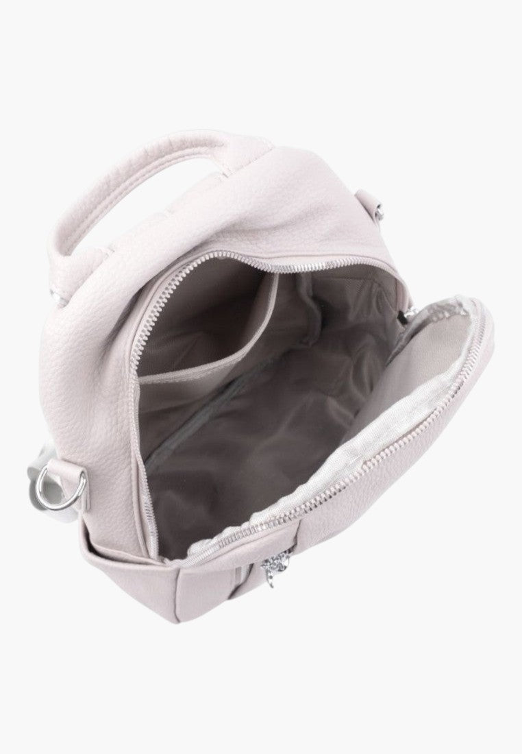 Falio urban women's backpack in light pink faux leather with an open main compartment and zipper closure
