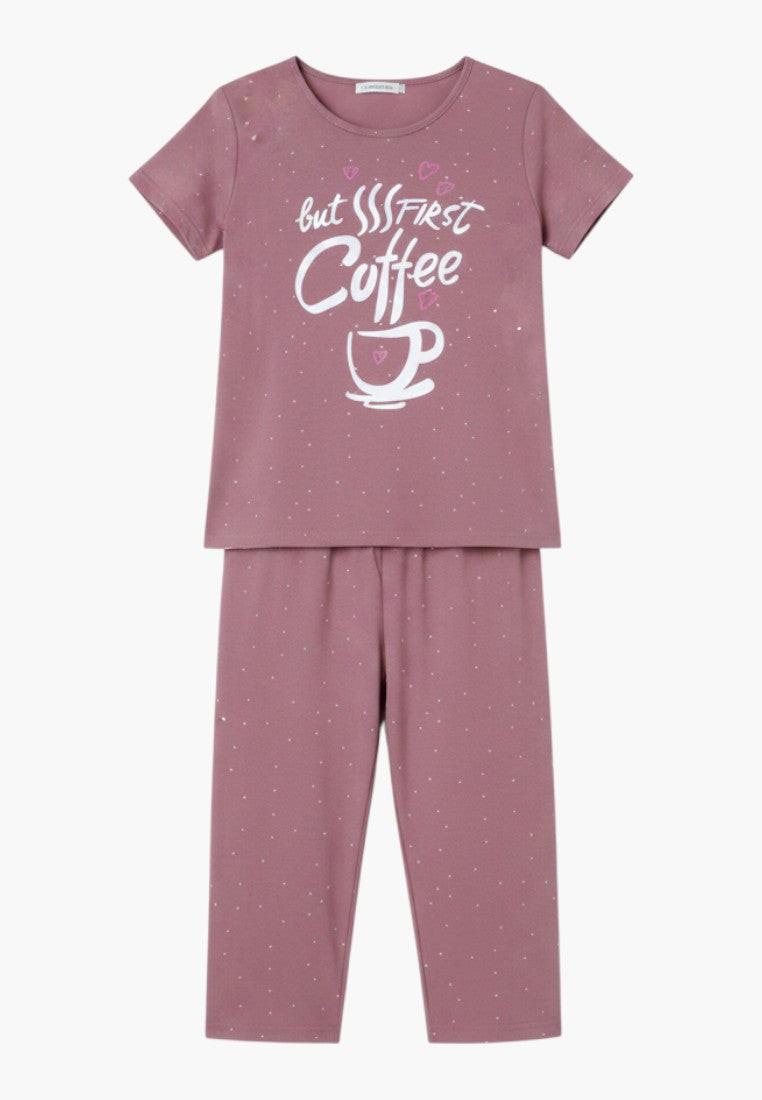 Falio women's mauve cotton pajama set with short sleeves, round neck, and 3/4 length pants featuring a 'but first coffee' graphic.
