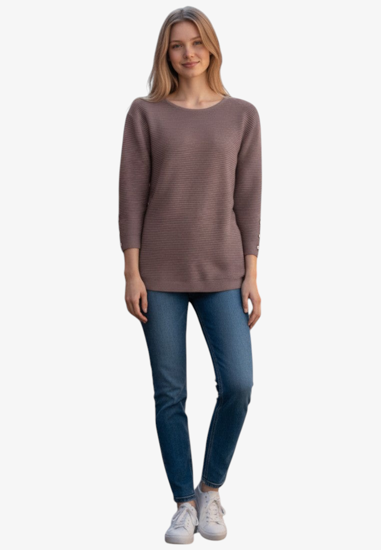 Falio women's mauve ribbed long-sleeve sweater with a round neckline worn with blue jeans and white sneakers.