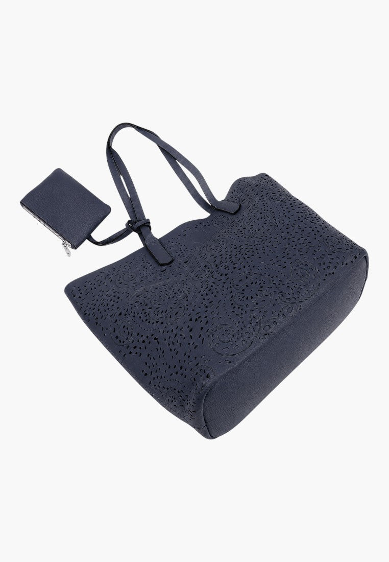 Falio navy blue faux leather shopper bag with intricate laser-cut floral patterns and a matching small pouch.