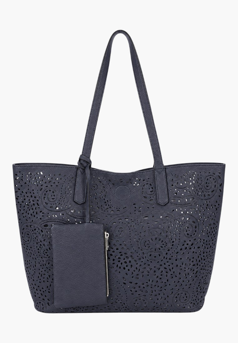 Falio navy blue faux leather shopper bag with intricate laser-cut floral patterns and a matching detachable pouch.