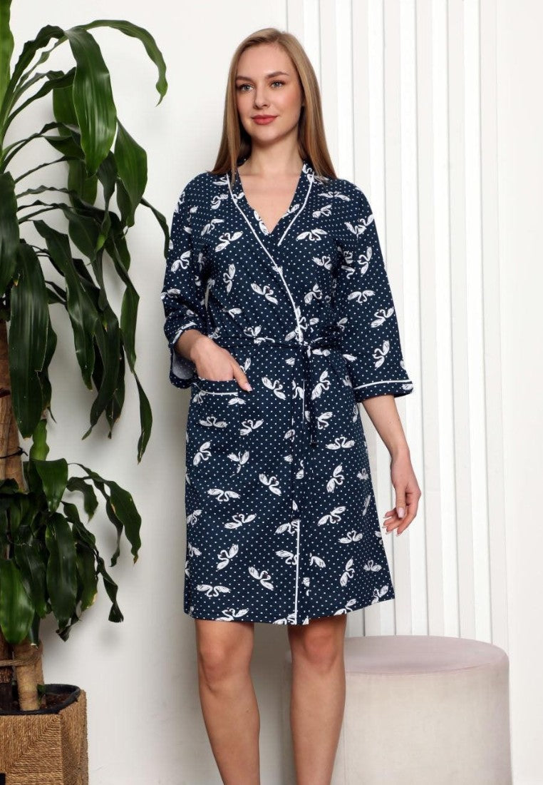 Falio cotton women's bathrobe in navy blue with white swan and polka dot print, short sleeves, and tie waist.