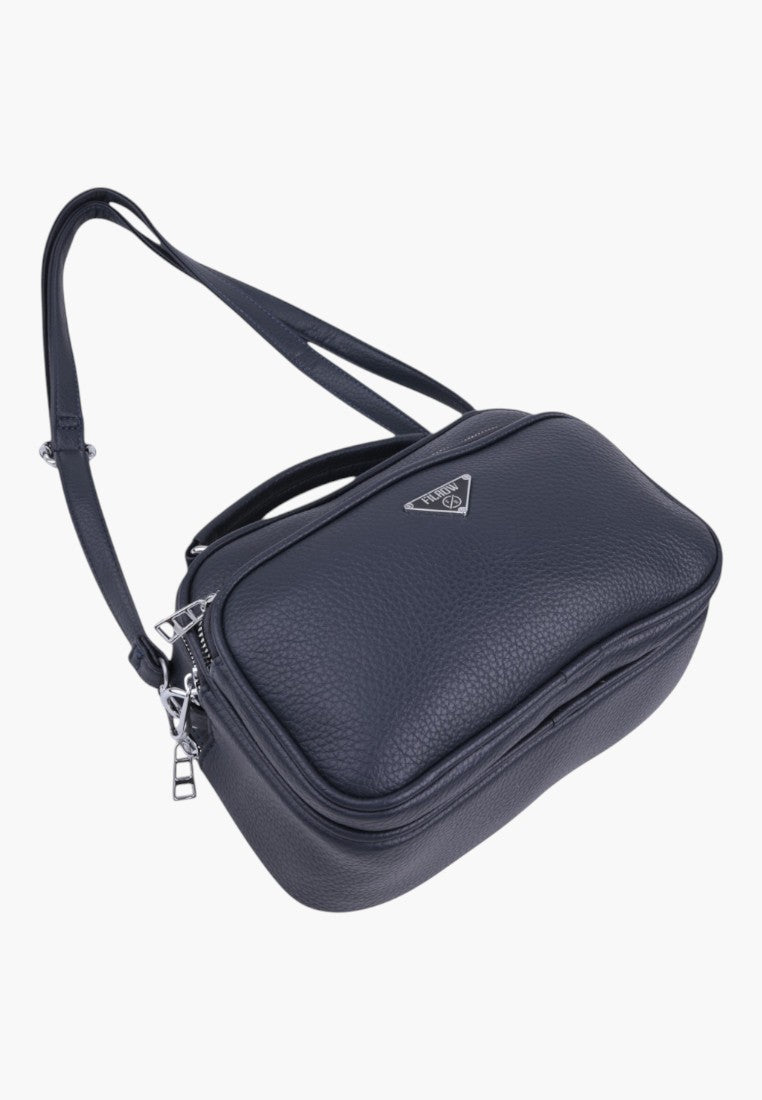 Falio navy blue faux leather crossbody bag with silver hardware, multiple compartments, and a top handle.