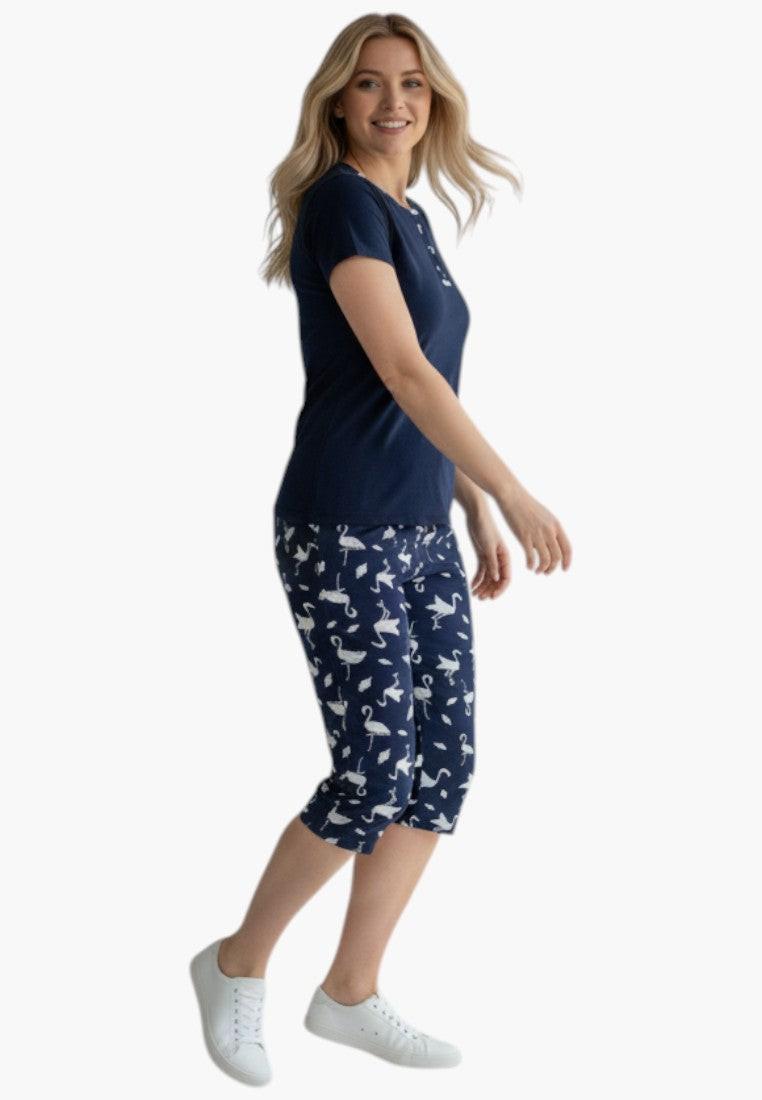Falio navy blue 100% cotton women's capri pajama set with white flamingo print and button detail on neckline.