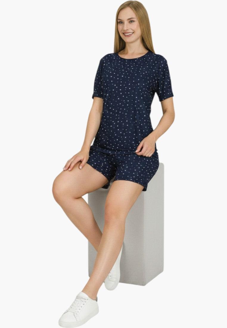 Falio navy blue cotton women's short pajama set with white star print. Includes t-shirt and shorts.