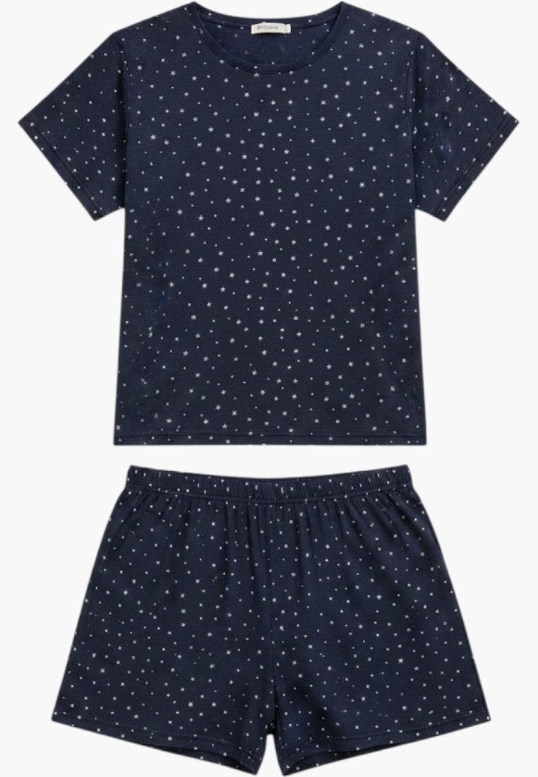 Falio navy blue cotton women's pajama set with white star print. Short sleeves, round neck top and matching shorts.