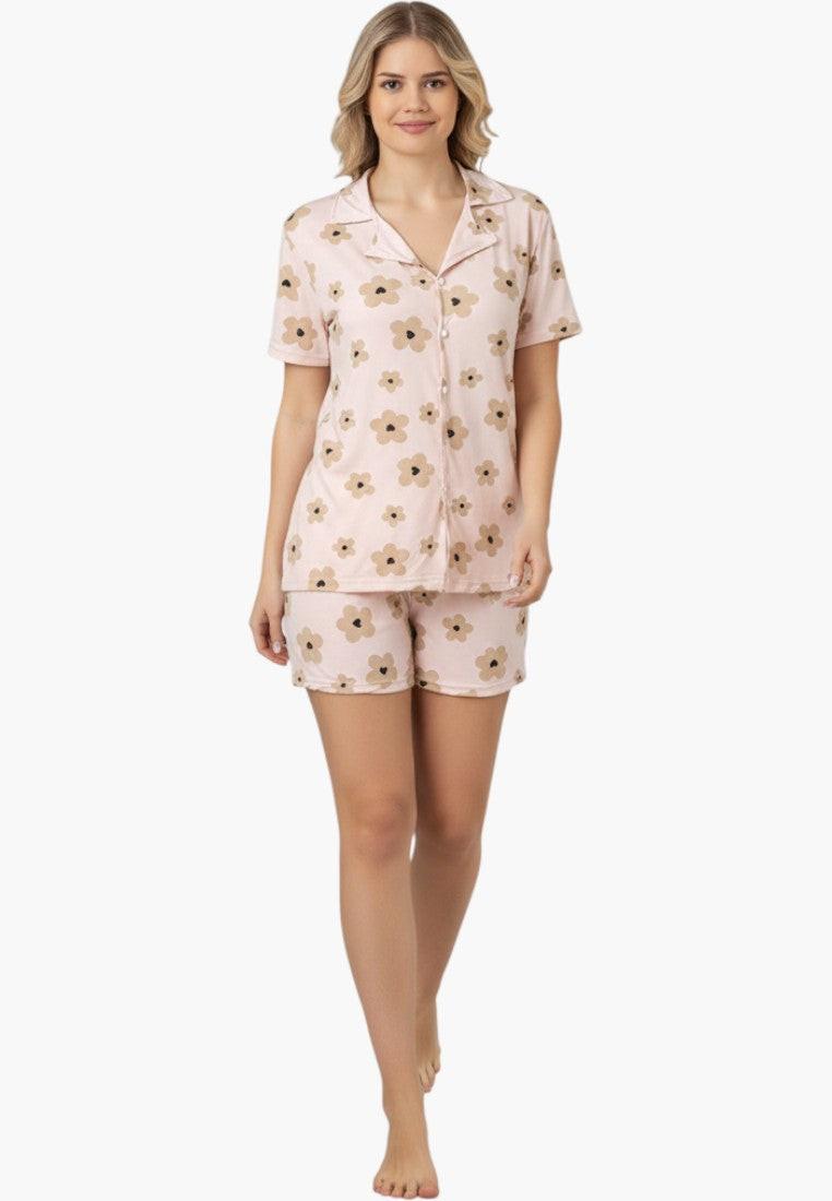 Falio women's pink 100% cotton pajama set with short sleeves, collar, button-up top, and floral print shorts.