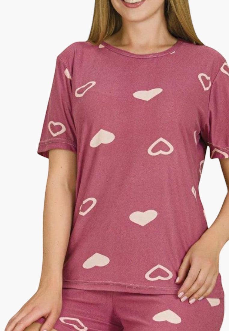 Falio women's pink cotton pajama set with a heart print. Short-sleeved top and shorts for comfortable sleepwear.