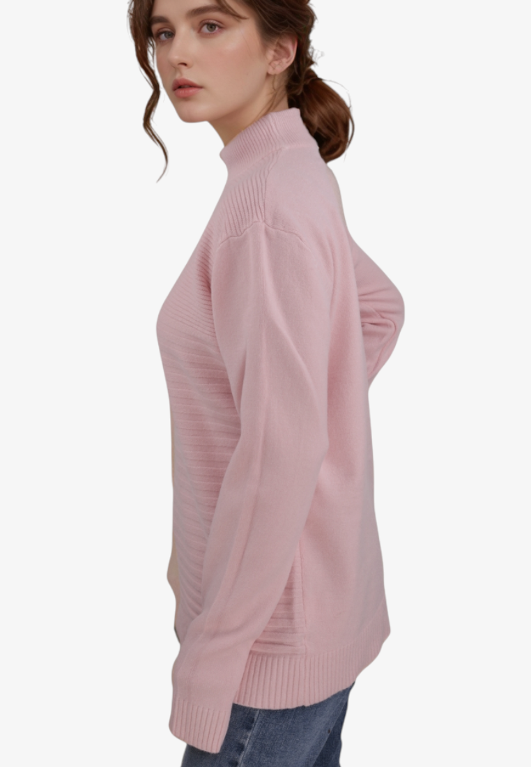 Falio pink mock neck sweater made of wool and cashmere blend worn by a woman, side view