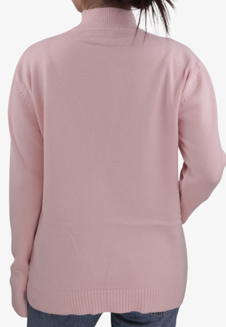Back view of a Falio pink wool-blend sweater with a mock neck and long sleeves worn over blue jeans
