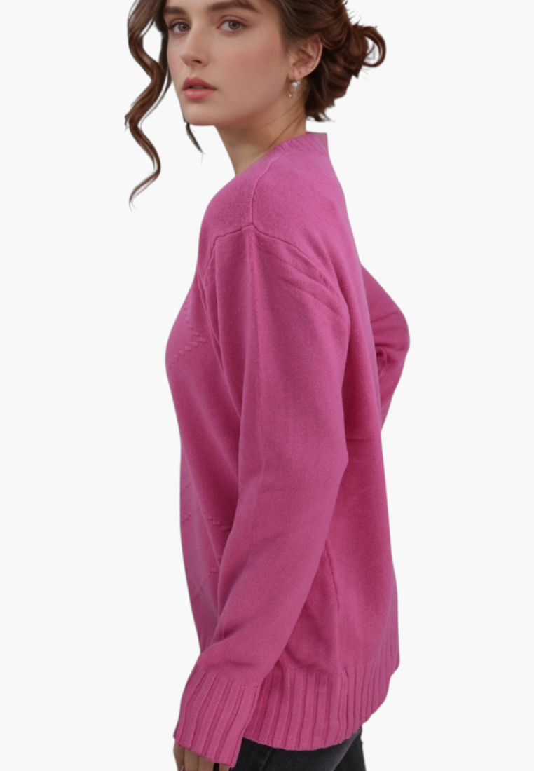Falio pink wool-blend long-sleeve sweater with a round neckline worn by a woman, side profile view.