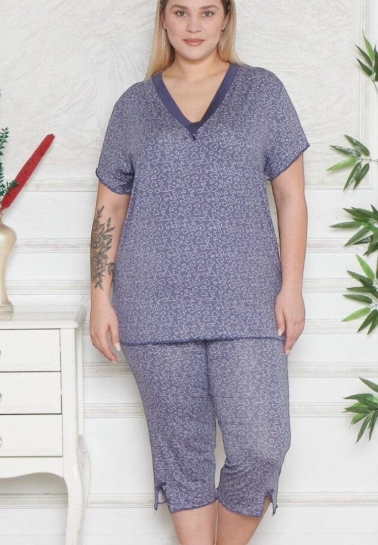 Falio plus size women's multi-colored viscose pajama set with short sleeves and 3/4 length pants featuring a heart print and V-neck.