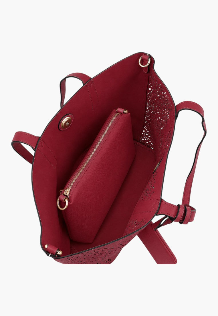 Falio red faux leather shopper bag with laser-cut floral details and an internal zippered pouch