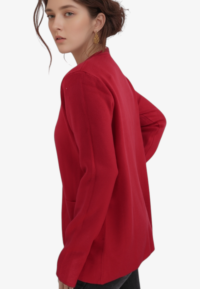Falio plus size red viscose cardigan with long sleeves and side pockets worn by a model in a side profile view