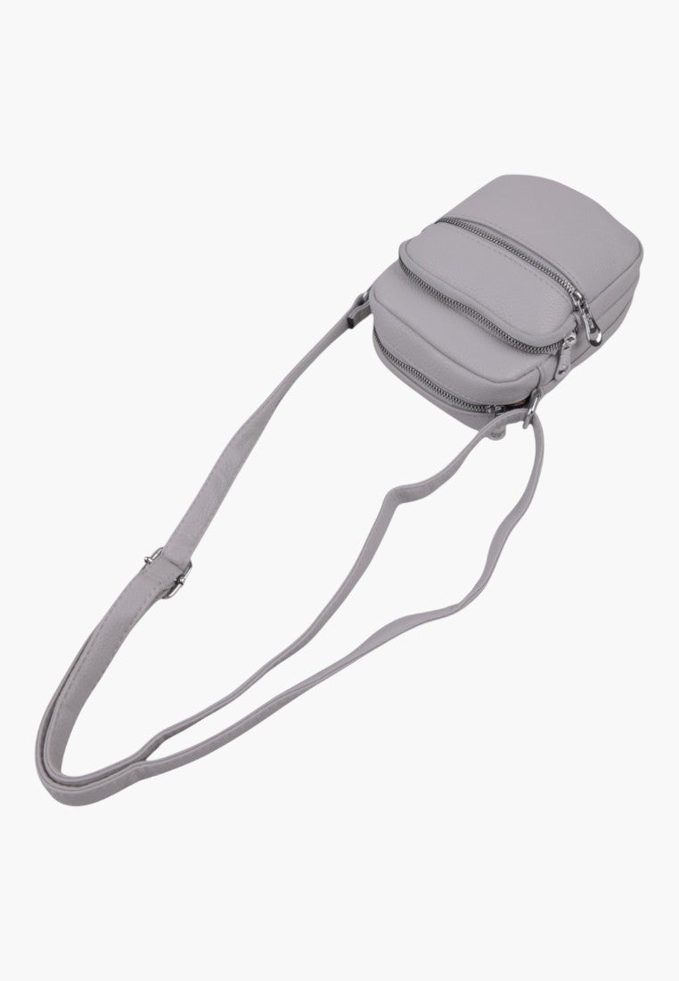 Falio small grey faux leather crossbody bag with two zippered compartments and an adjustable shoulder strap