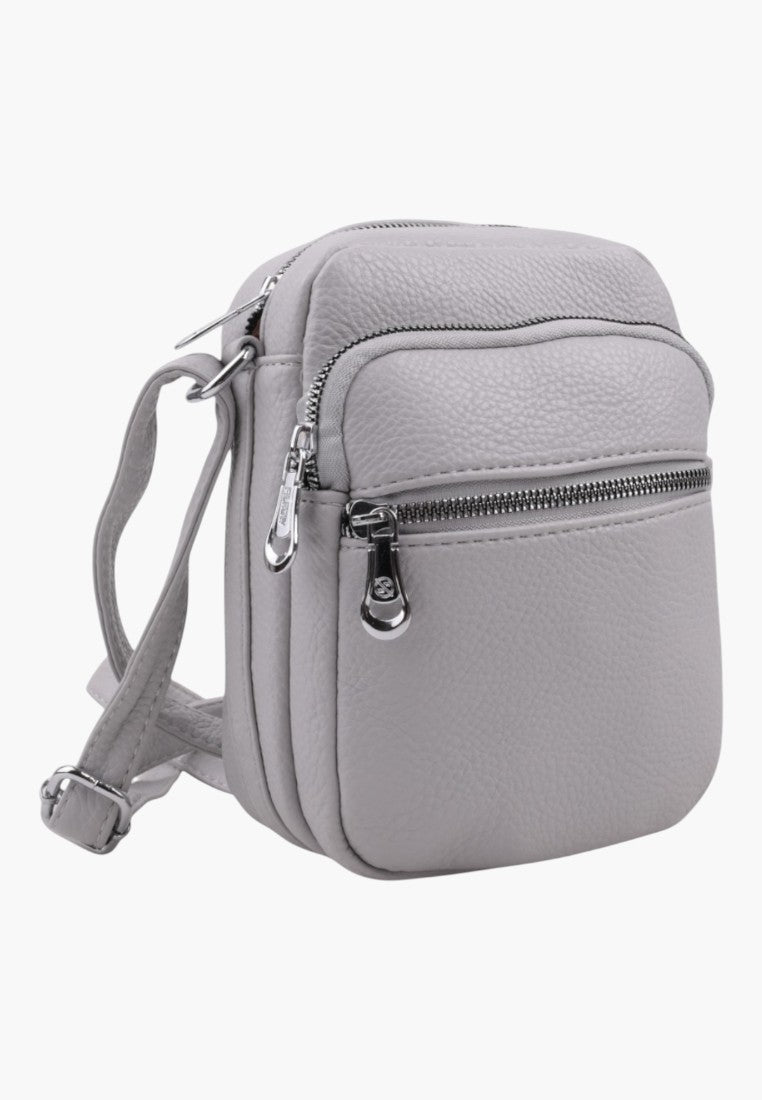 Falio small grey faux leather crossbody bag with a zippered front pocket and adjustable shoulder strap
