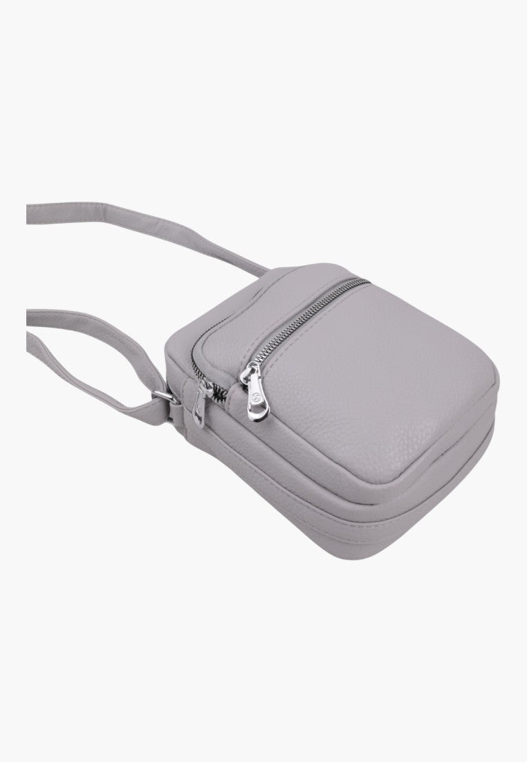 Falio small grey faux leather crossbody bag with a zippered front pocket and adjustable shoulder strap