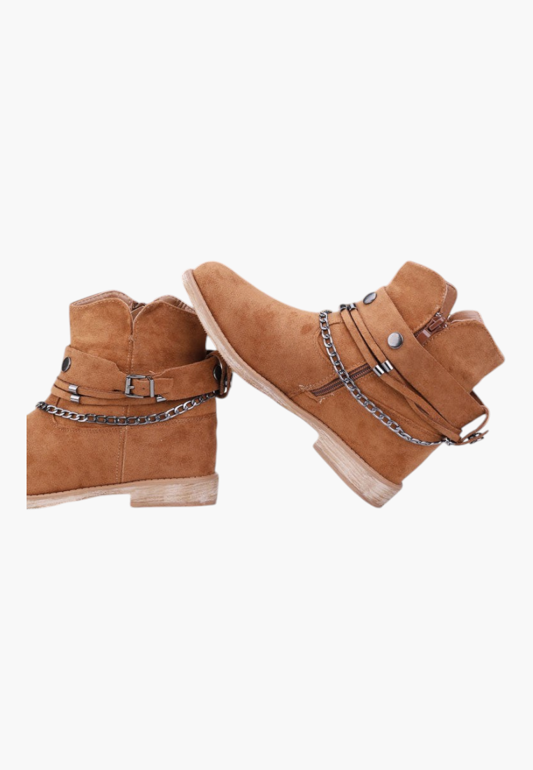 Falio women's tan faux suede ankle boots with hidden wedge, removable chain straps, and side zipper closure.