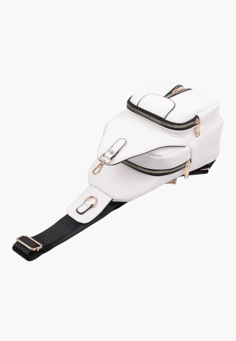 Falio white urban sling backpack made of eco-leather with black accents, multiple zippered pockets, and strap.