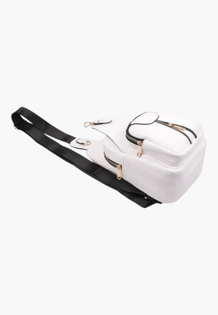 Falio white faux leather urban sling backpack with black strap and gold zippers