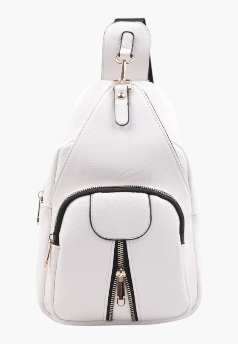 Falio white faux leather urban sling backpack with front zipper pocket and gold hardware