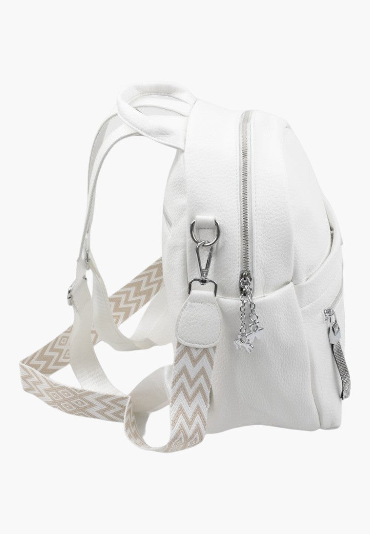 Falio white faux leather urban backpack with patterned straps and silver zipper details, side view.