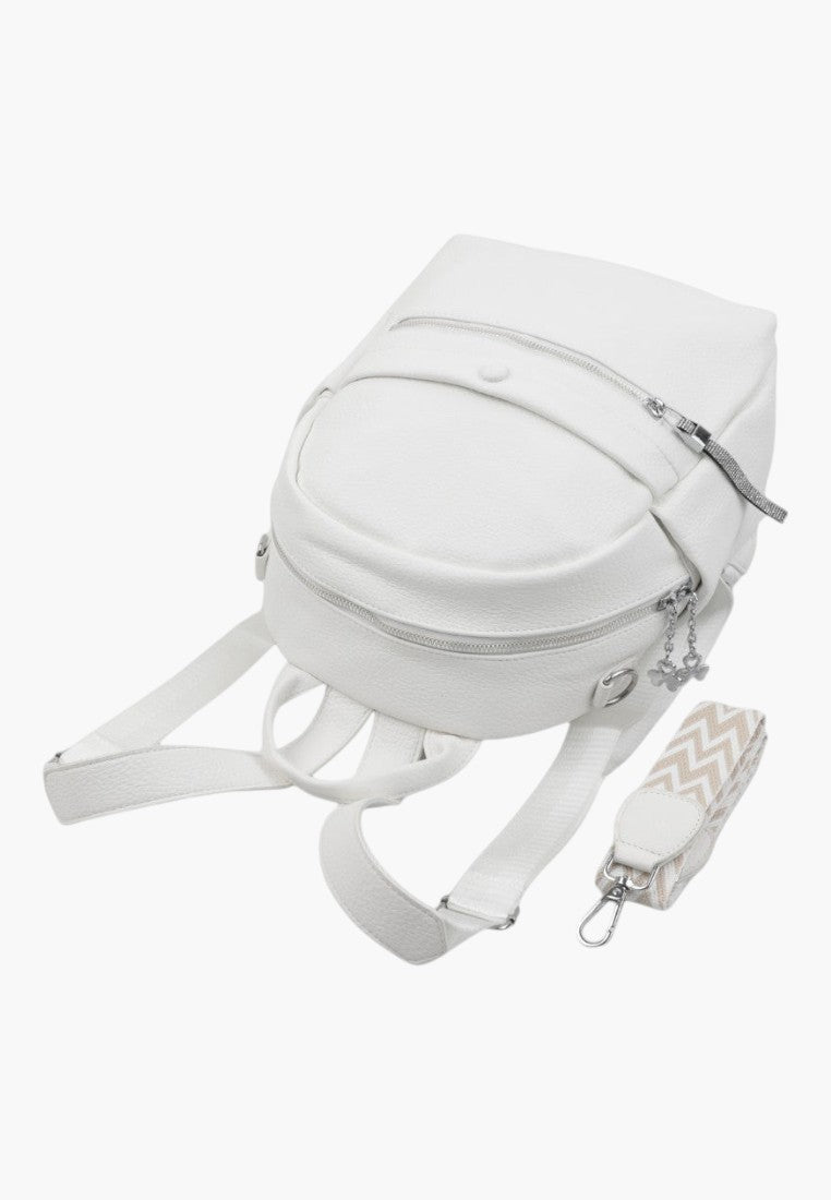 Falio white faux leather urban backpack with multiple zippered pockets and a detachable patterned shoulder strap