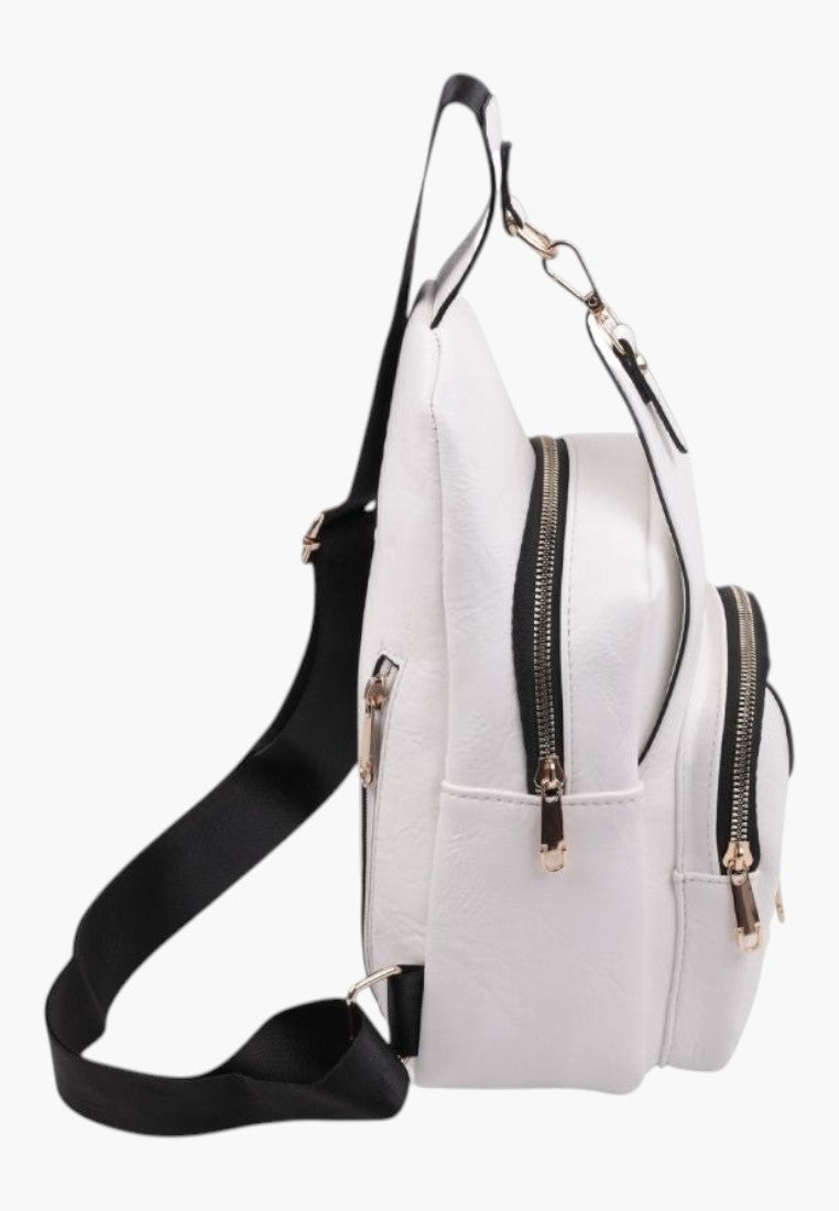 Falio white urban faux leather backpack with black strap and multiple zippered compartments, side view