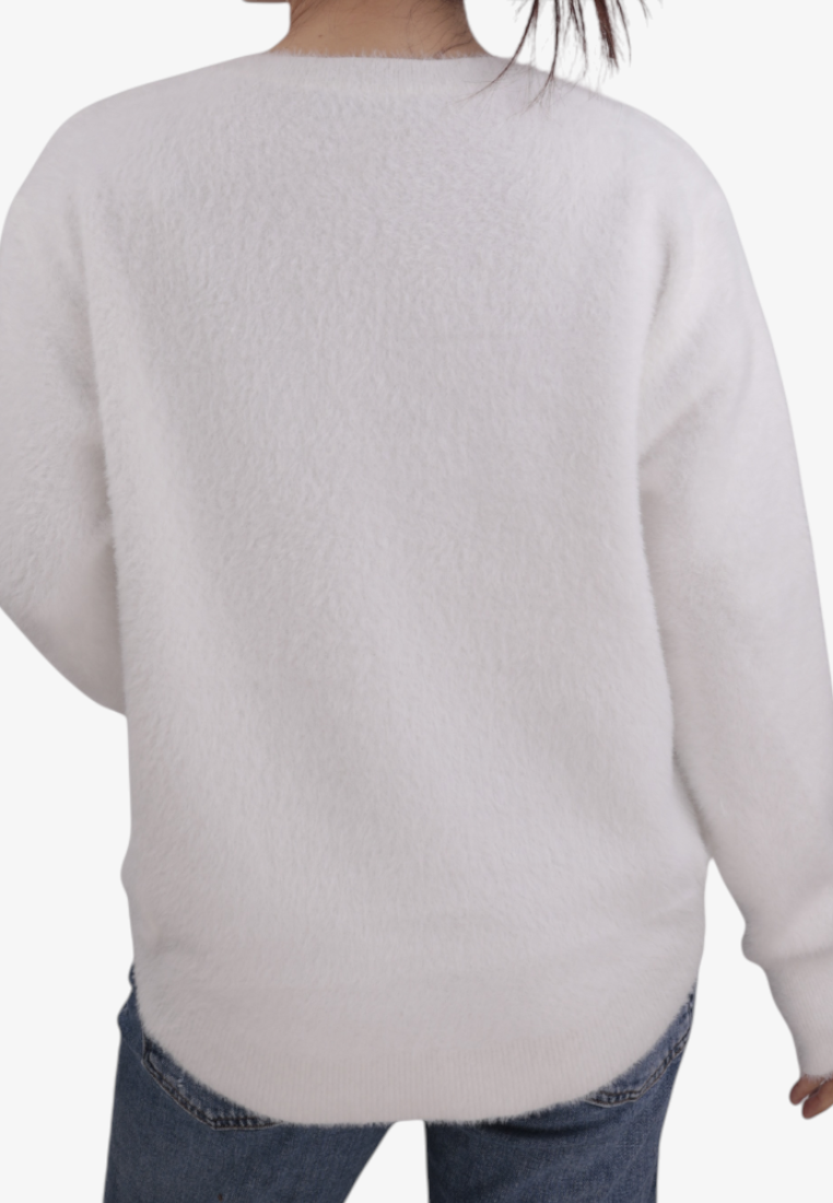 Falio white wool-blend sweater with a soft texture worn by a woman, back view