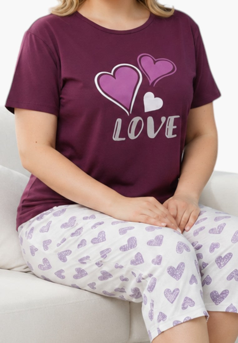 Falio cotton women's pajama set with a purple heart-print top and white heart-patterned cropped trousers