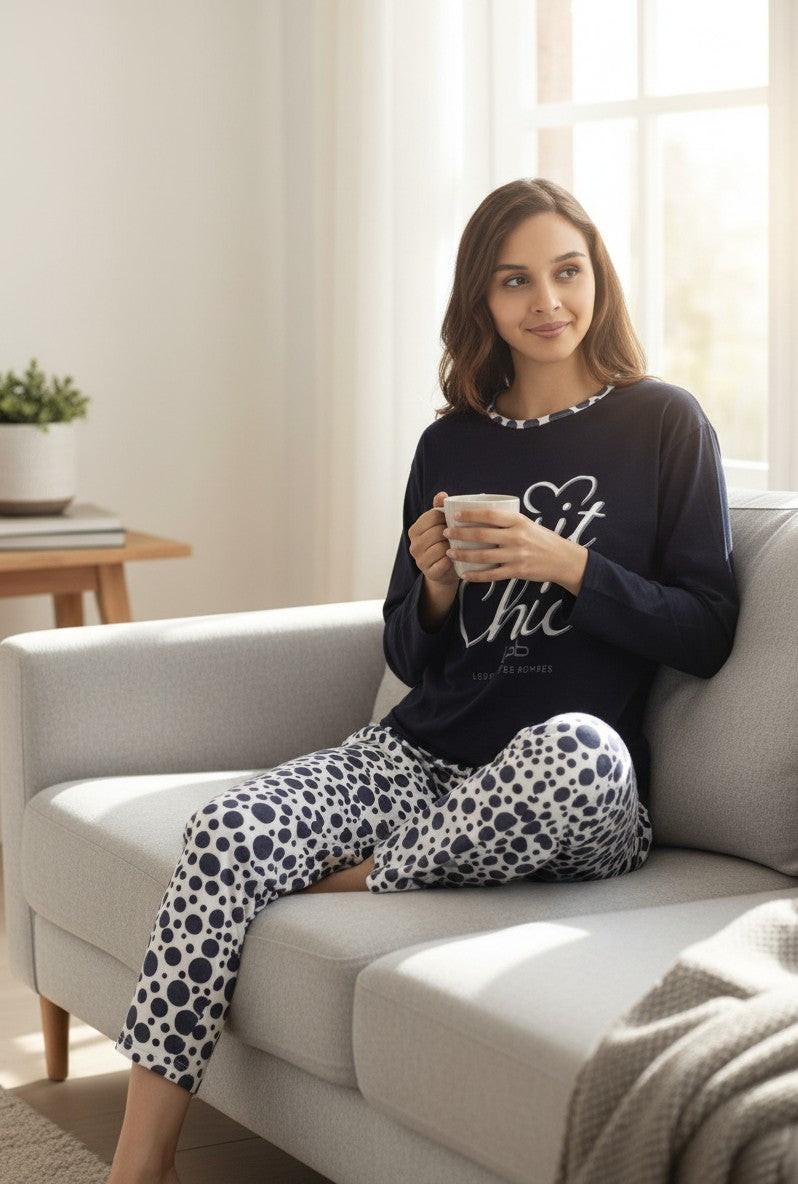 Falio women's navy blue cotton pajama set with white polka dot pants and "Esprit Chic" graphic on the top.