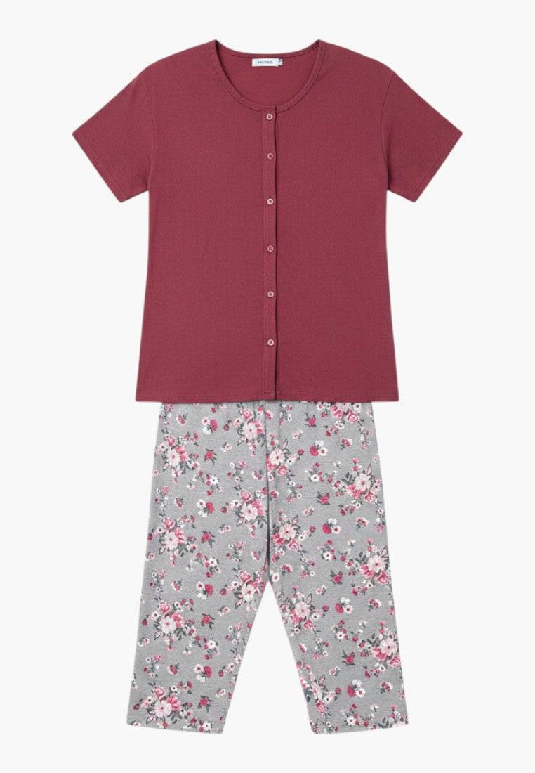 Falio women's plus size 100% cotton pajama set with short sleeves, round neck, button-up top, and floral print 3/4 pants.