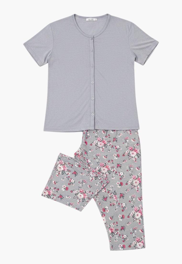 Falio grey 100% cotton plus size women's 3/4 sleeve pajama set with floral print capri pants and button-up top.