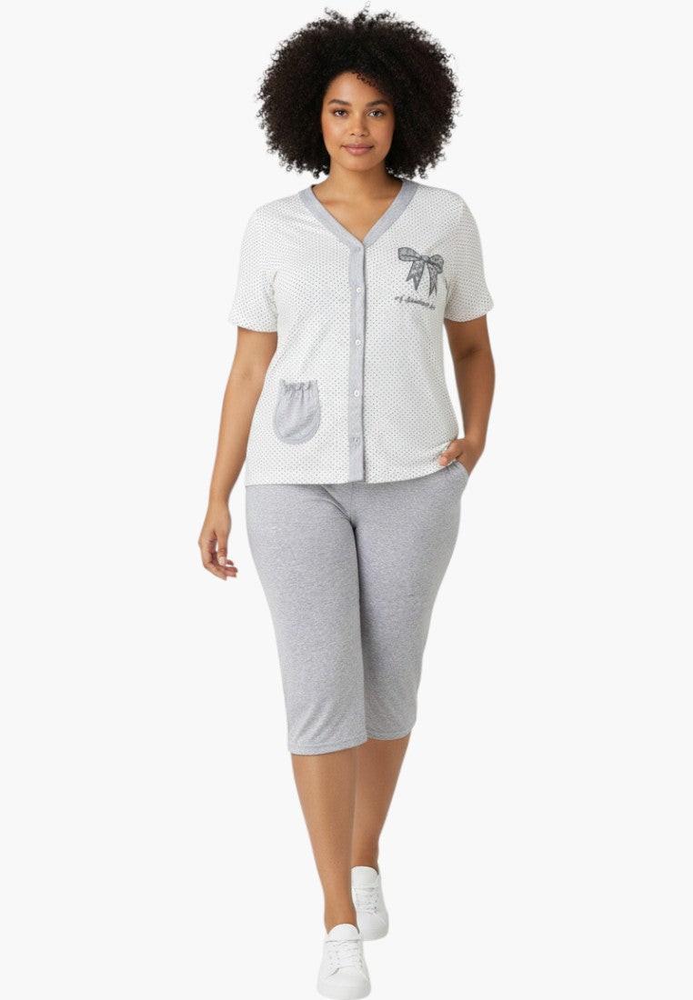 Falio women's white polka dot pajama set with grey trim, short sleeves, V-neck, button-up, and 3/4 length pants.