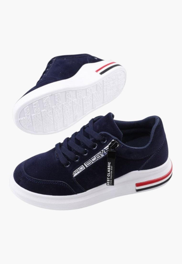 Granatowe sneakersy damskie o minimalistycznym designie, widok z boku.