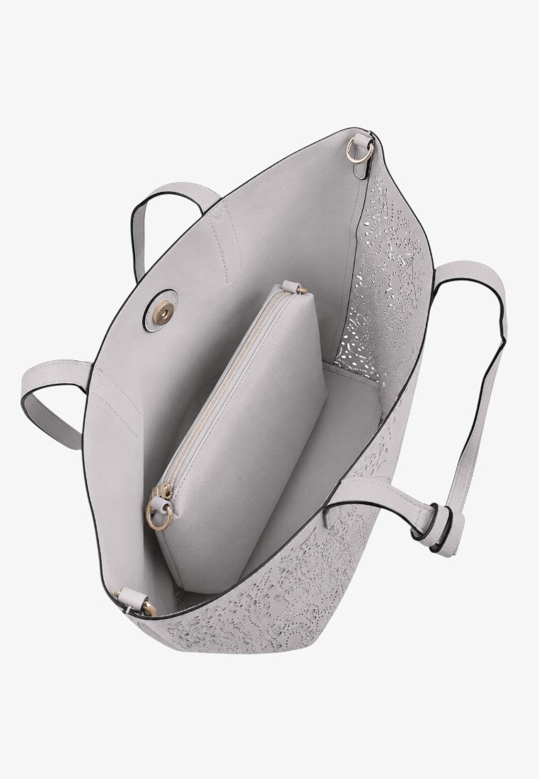 Detail view of the interior of a gray handbag with an open design and inner pocket on a white background.