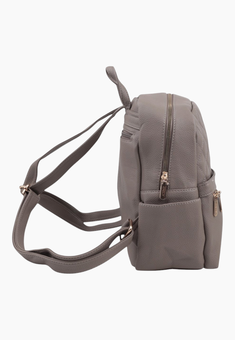 Side view of the quilted gray backpack featuring adjustable straps and a side pocket.