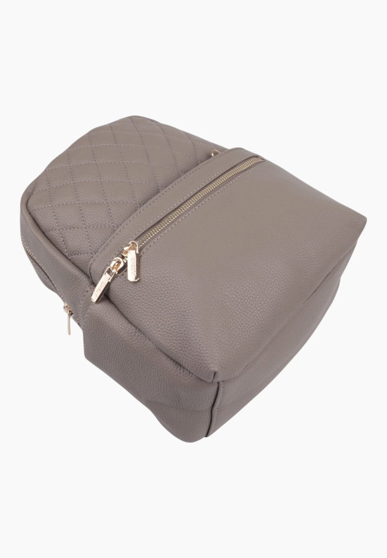 Side view of the gray backpack showcasing zipper closure and gold hardware.