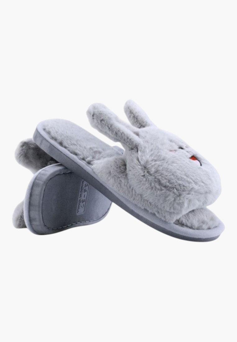 Side view of gray rabbit design slippers on a white background