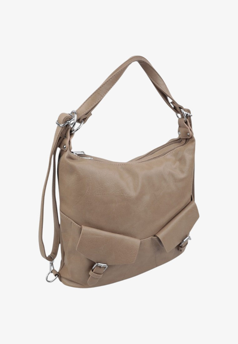 Side view of the beige handbag featuring two front pockets and shoulder strap on a white background.