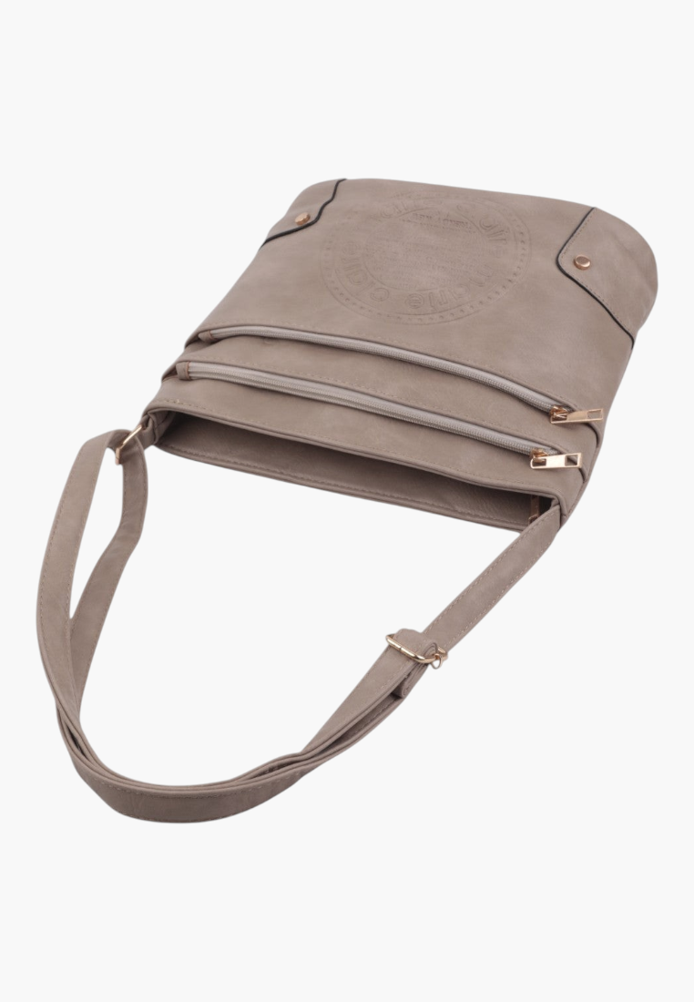 Back view of khaki faux leather crossbody bag with flat design and logo detail.