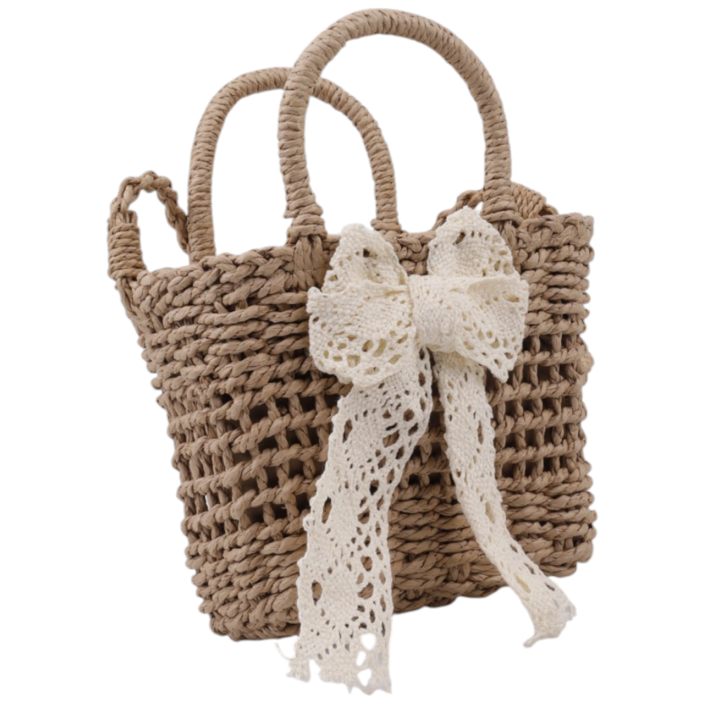 Front view of a brown and white woven handbag with two handles and a bow detail.